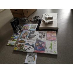 Wii console met 14 games enz