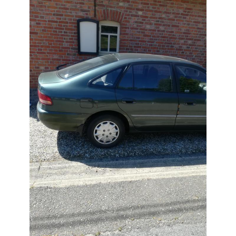 Old-timer Mitsubishi Galant coupé met electrisch schuifdak