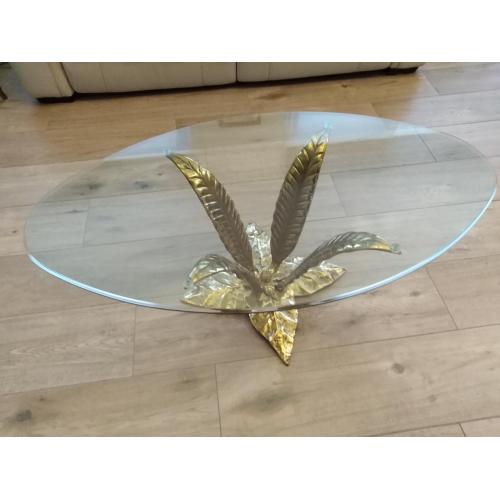 Ovalen glazen salontafel met massief koperen voet