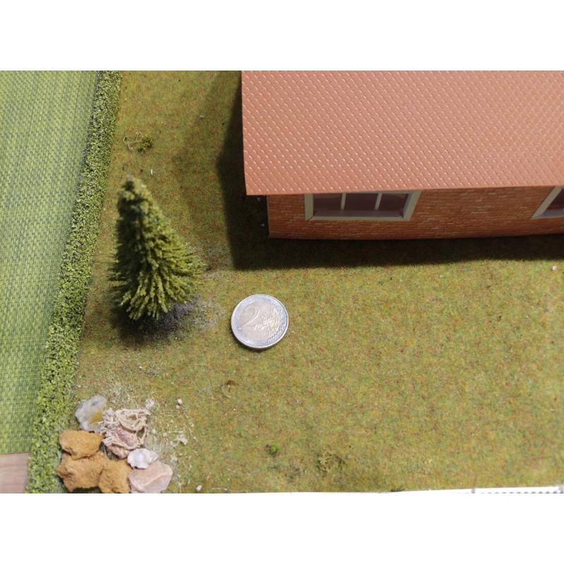 Diorama van een huis met een tuin