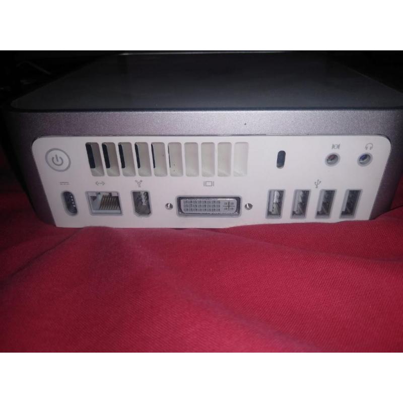 Te Koop een Mac Mini 2.1 Intel Core 2 Duo 64 Bit Computer met Serienummer YM8432JDYL1 met 1,83 Ghz en de Stroomadapter