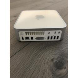 Te Koop een Mac Mini 2.1 Intel Core 2 Duo 64 Bit Computer met Serienummer YM8432JDYL1 met 1,83 Ghz en de Stroomadapter