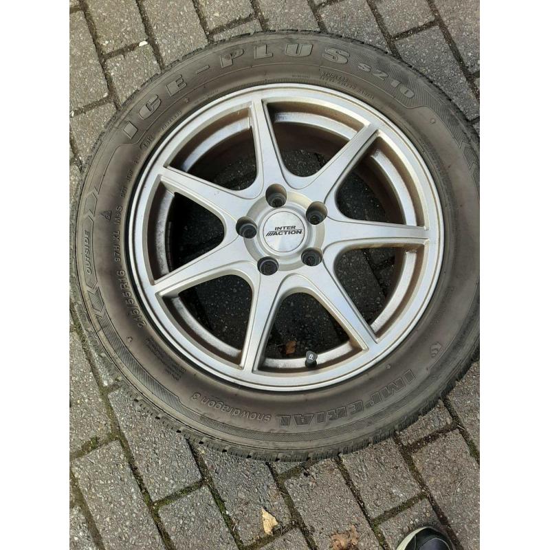 4 winterbanden  op aluminium velgen maat 215/55R16 97HXL